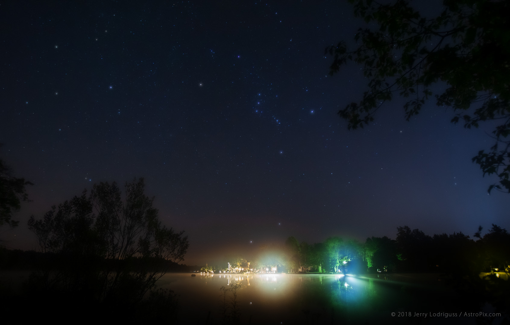 The constellation of Orion rises over fog on the Mullica River in the Pine Barrens of New Jersey.