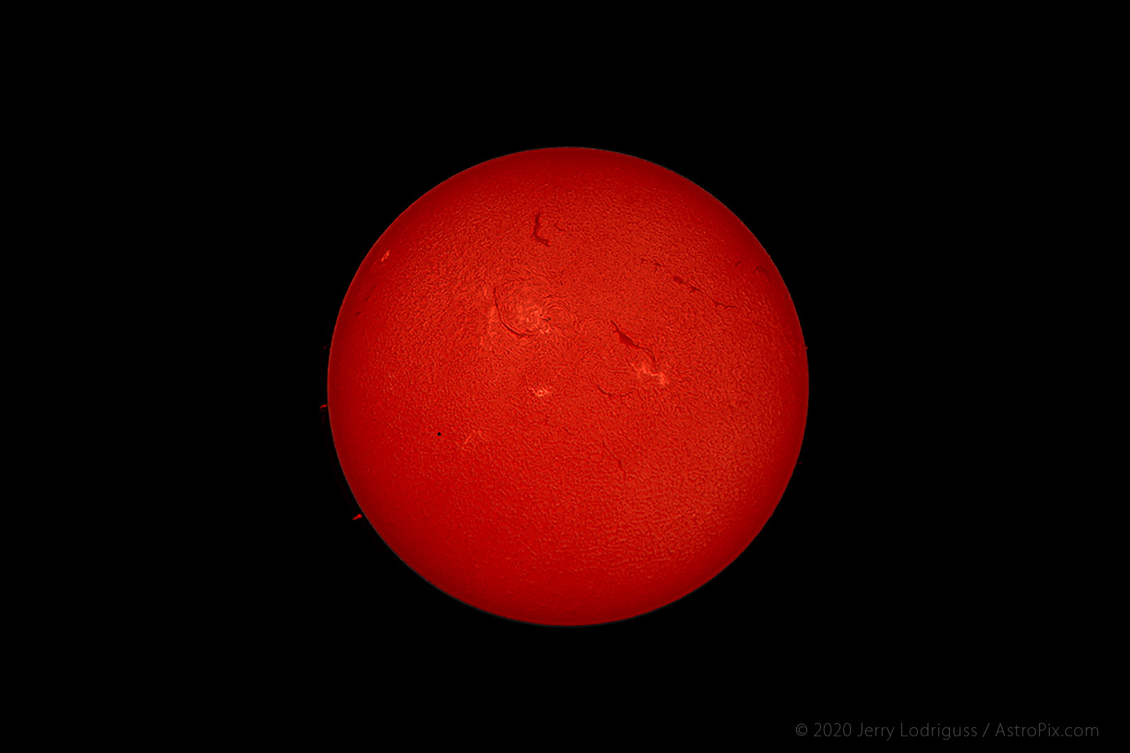 Mercury transits across the Sun on May 9, 2016.  This image was shot in narrowband hydrogen-alpha light.