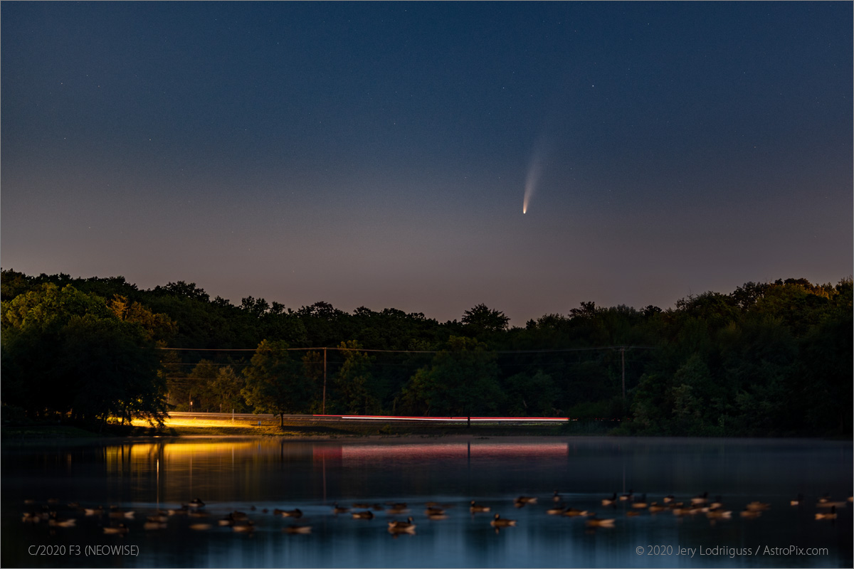 Comet C/2020 F3 (NEOWISE) rises above Silver Lake in suburban Philadelphia on July 7, 2020 at 4:13 a.m. EDT. This is almost 40 minutes into the start of astronomical twilight, from the light-polluted Philadelphia suburbs, with a nearly full moon in the sky. Sigma 105mm f/1.4, Nikon Z6, single 8-second exposuer at f/1.4 at ISO 100.