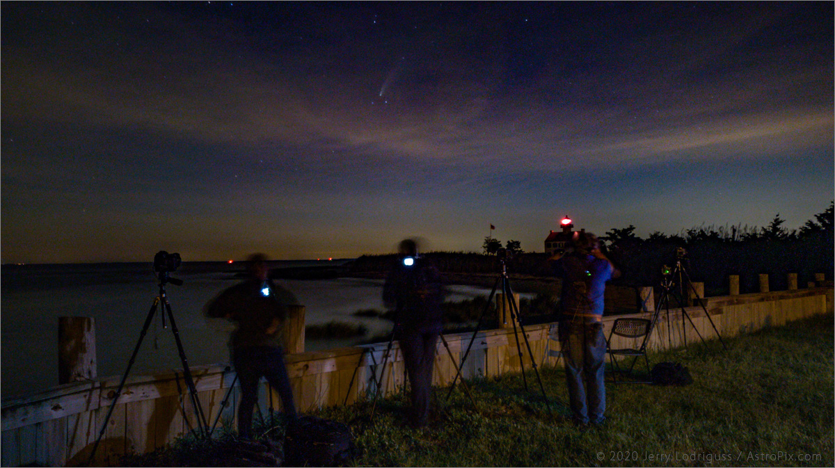 Photographers line up to shoot Comet NEOWISE over the East Point Lighthouse. About two dozen where there for the sunset, but about half left before it was dark enough to see the comet, which was unfortunately somewhat obscured by clouds this night.<br /><br /><br />Galaxy S10 cell phone<br />4.3mm focal length lens<br />30-second exposure at ISO 100 at f/1.5<br />Manual exposure on a tripod.