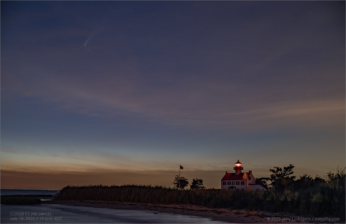 Comet NEOWISE forms a triangle with Kappa and Iota Urase Majoris in the clouds above the Delaware Bay and East Point Lighthouse on July 18, 2020. I was hoping the comet would eventually set into the opening the clouds, but...<br /><br />Nikkor 50mm f/1.4 AI-S working at f/1.4<br />8-second exposure<br />ISO 400