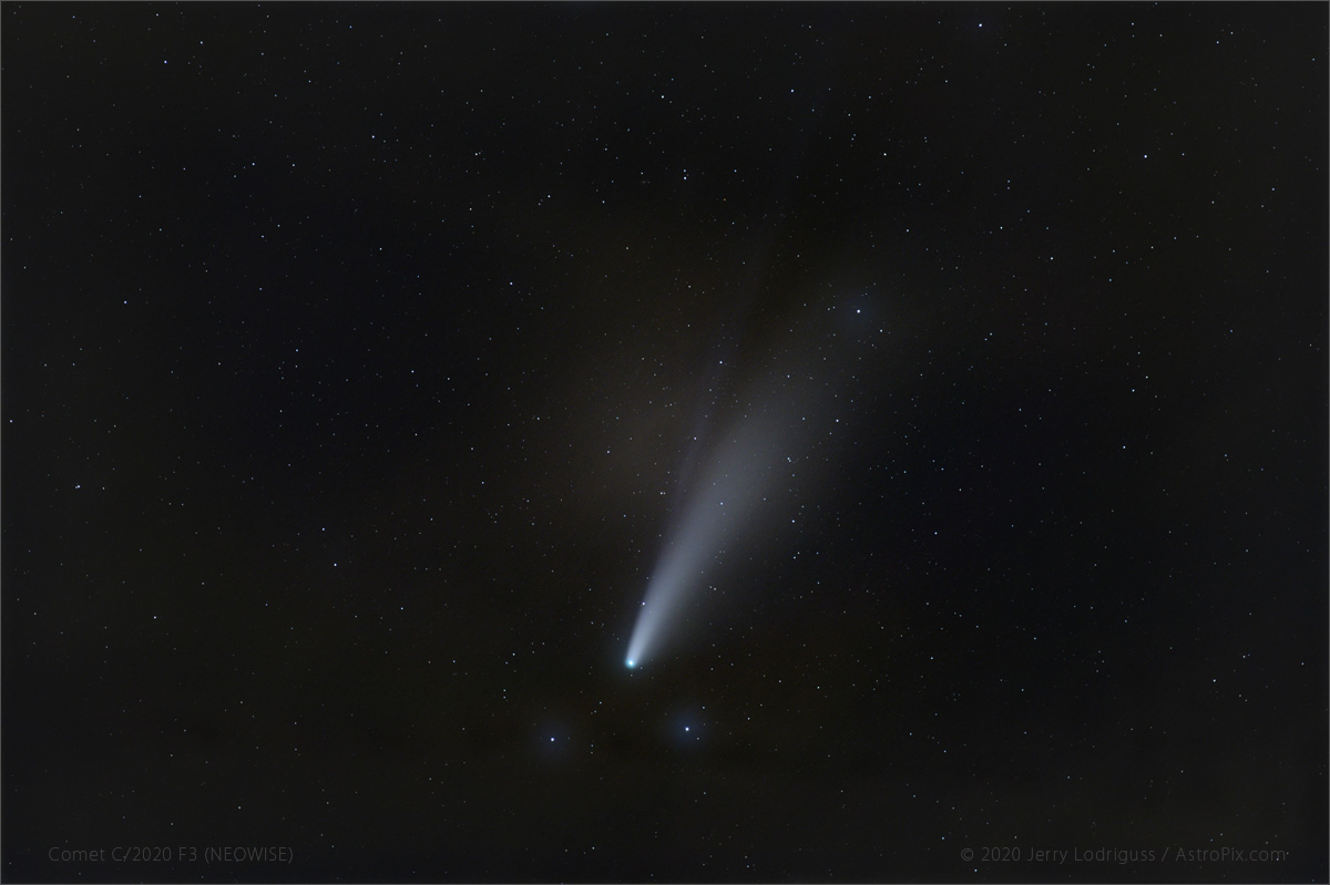 The comet's thin blue ion tail and broader white dust tail are visible through the clouds in the previous image. <br /><br />Sigma Art 105mm f/1.4 working at f/1.4<br />Nikon Z6<br />Stack of 100 x 5-second exposures at ISO 800<br />iOptron SkyTracker
