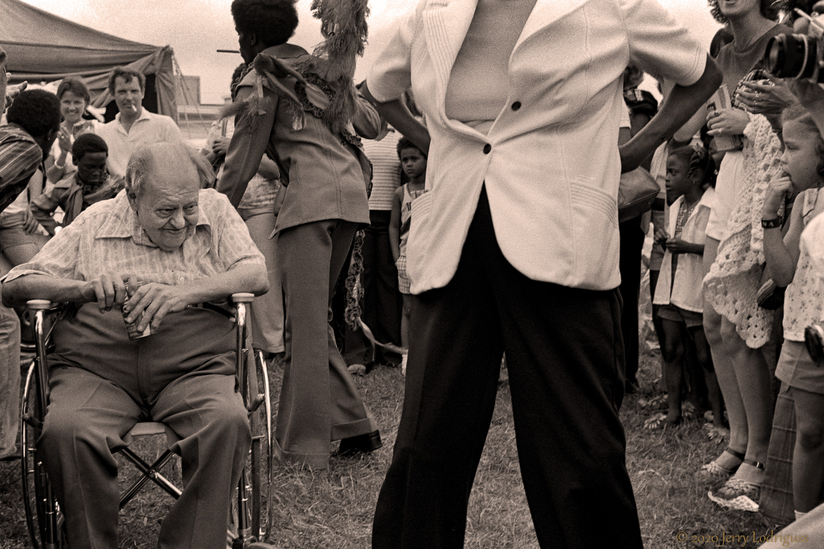 Jazzfest dancer and appreciative watcher.