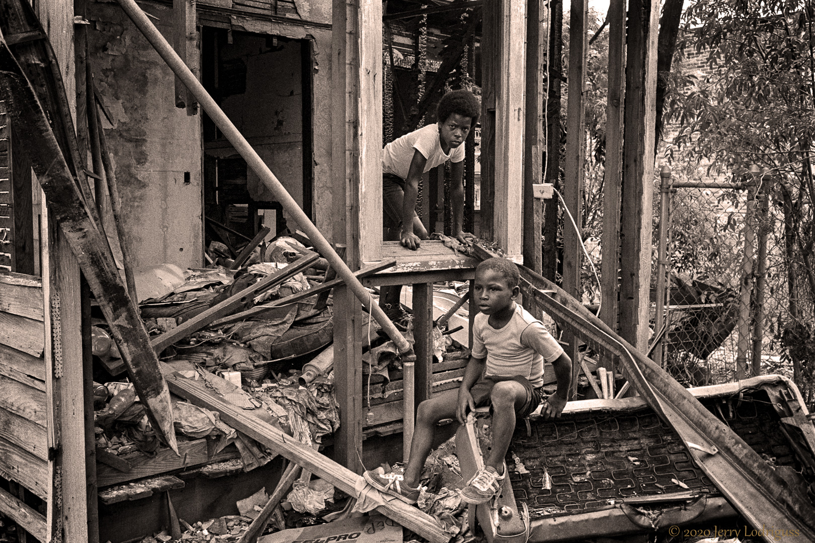 Two children play in the rubble of a burned out house in the 7th ward of New Orleans.