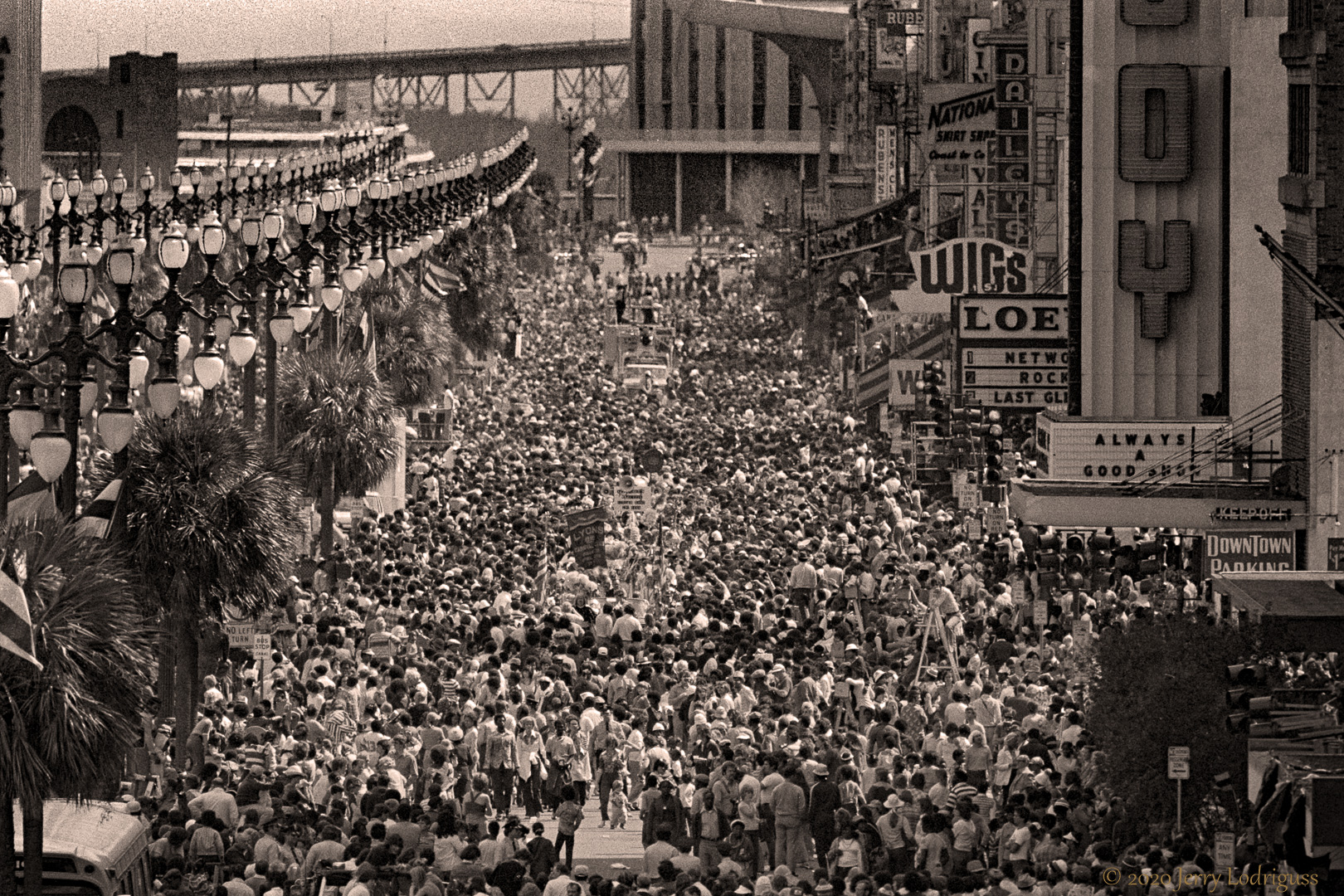 Crowds pack Canal Street on Mardi Gras day.