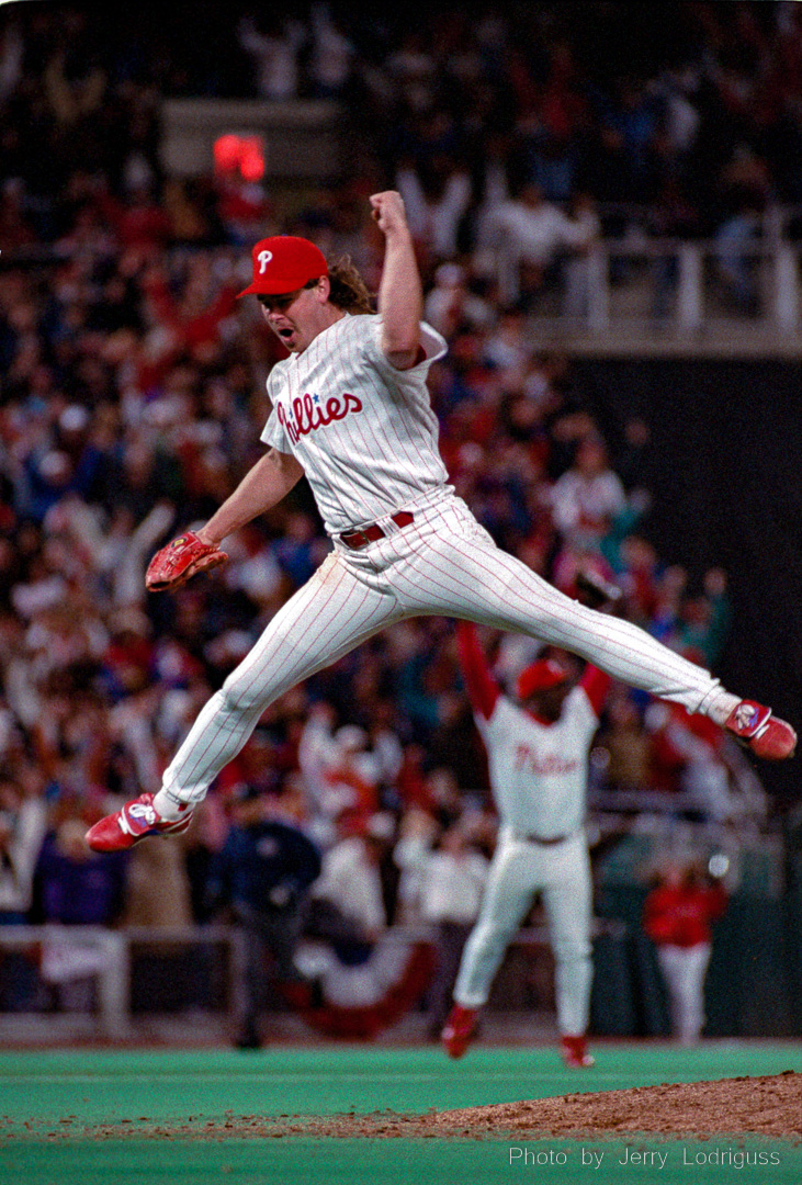 Phillies closer Mitch Williams jumps in the air in jubilation after recording the final out by striking out the Braves Bill Pecota with a 3-2 fastball in the 9th inning to secure the National League Pennant.  The Philadelphia Phillies beat the Atlanta Braves 6-3 at Veterans Stadium in Philadelphia on Wednesday October 13, 1993 in game 6 of the National League Championship series to clinch the National League Pennant 4 games to 2.
