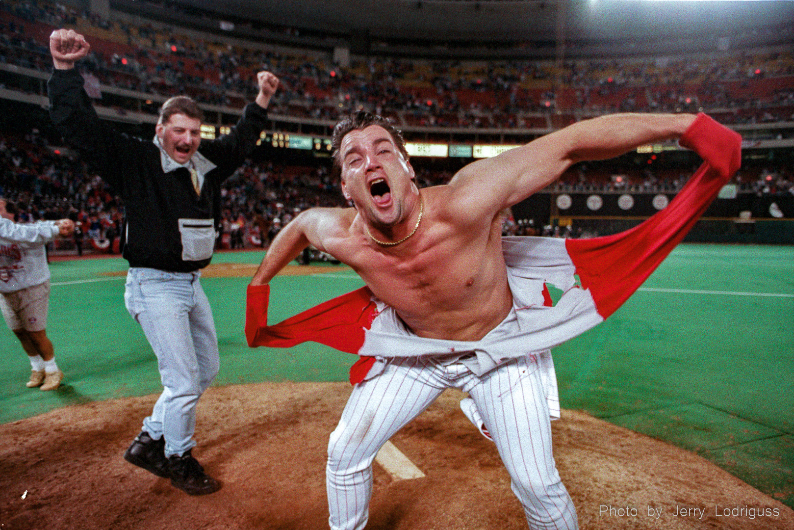 Phillies pitcher Danny Jackson does his imitation of the Incredible Hulk by ripping off his jersey after getting "pumped up" after the Philadelphia Phillies won the National League Pennant by beating the Atlanta Braves 6-3 at Veterans Stadium in Philadelphia on Wednesday October 13, 1993 in game 6 of the National League Championship series.