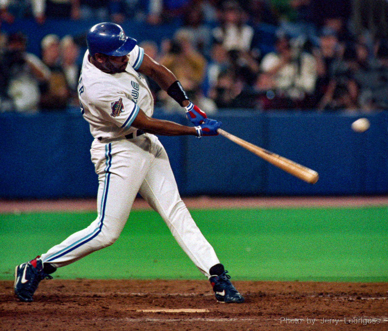 Toronto Blue Jays' Joe Carter hits a 2-2 fastball down and in over the wall in left field off the Phillies Mitch Williams for his game-winning, three-run 379 foot home run in the bottom of the ninth inning of game six, leading his team to the World Championship with a 8-6 victory over the Philadelphia Phillies on Saturday October 23, 1993 at Skydome in Toronto. It was the first bottom-of-the-ninth inning, walk-off, come-from-behind, series-winning  home run  in the history of the World Series.