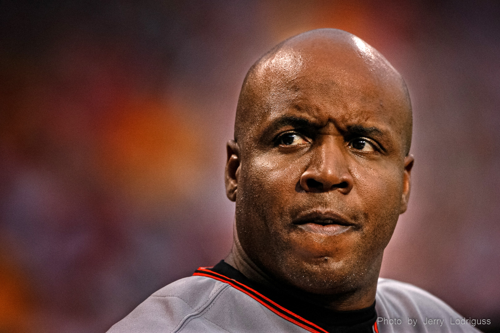 San Francisco Giants' Barry Bonds pauses in the dugout before hitting an RBI-double against the Phillies.  Bonds, considered one of the greatest baseball players of all time, won 7 National League Most Valuable Player awards, 8 Gold Golves, 12 Silver Slugger award, and was selected to the all-star team 14 times. Bonds holds the record for most career home runs (762), and most homers in a single season (73). He also holds the record for most career walks (2,558) and stole 514 bases. He is the only player with more than 500 home runs and 500 stolen bases.<br /><br />Bonds was a central character in baseball's steroid scandals. He was indicted and convicted of obstruction of justice in a federal investigation, but the charges were overturned. Although eligible for the National Baseball Hall of Fame, he has not been elected because of his alleged steroid use.