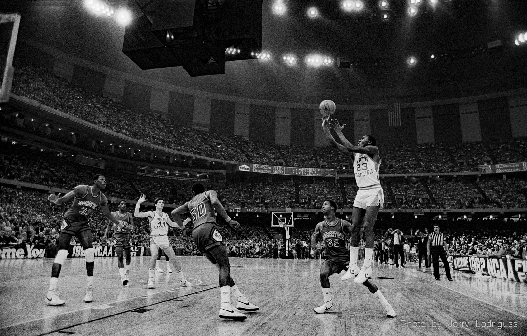 Michael Jordan hits the game-winning jump shot to beat Georgetown and claim the 1982 NCAA basketball national championship for the North Carolina Tarheels in the Louisiana Superdome in New Orleans.