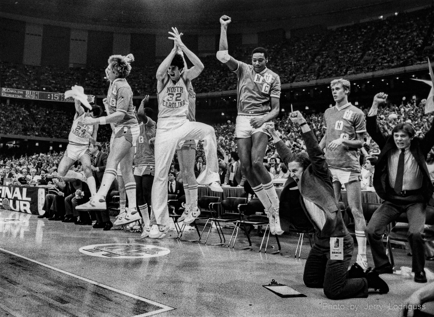 The North Carolina bench erupts with joy with 15 seconds left after Michael Jordan hit the game-winning jump shot to beat Georgetown and claim the 1982 NCAA basketball national championship.