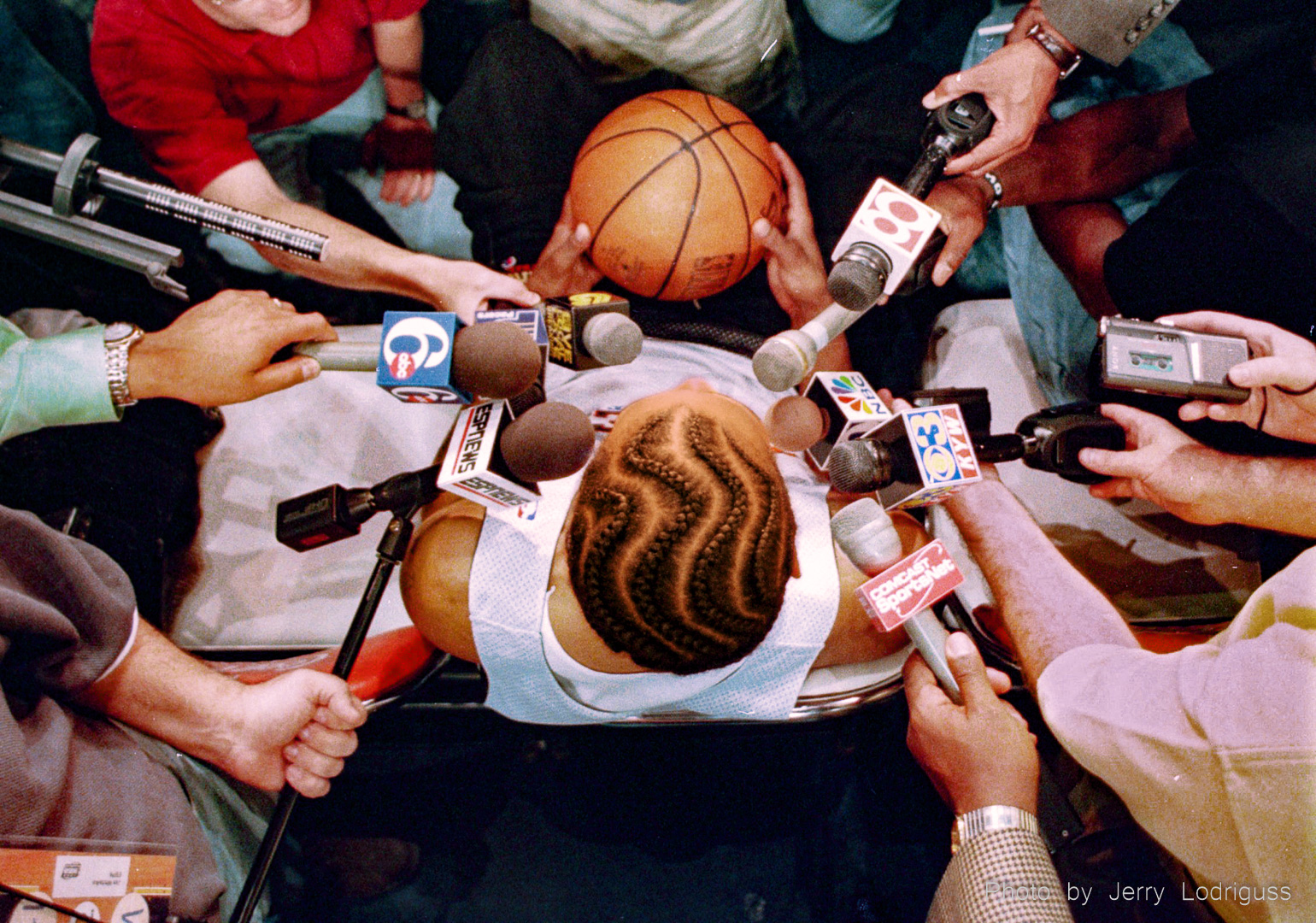 Sixer's Allen Iverson talks with the media after practice here today in Indianapolis, IN on May 18, 1999. Iveron's corn rows revolutionized hair styles in the NBA.