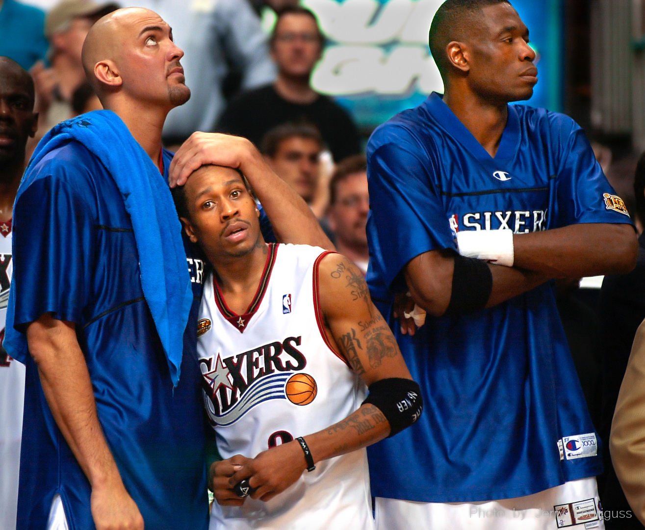 Philadlephia 76ers Matt Geiger consoles teammate Allen Iverson in the closing seconds of their loss to the Los Angeles Lakers in the final game of the NBA Championship Finals on June 15, 2001.