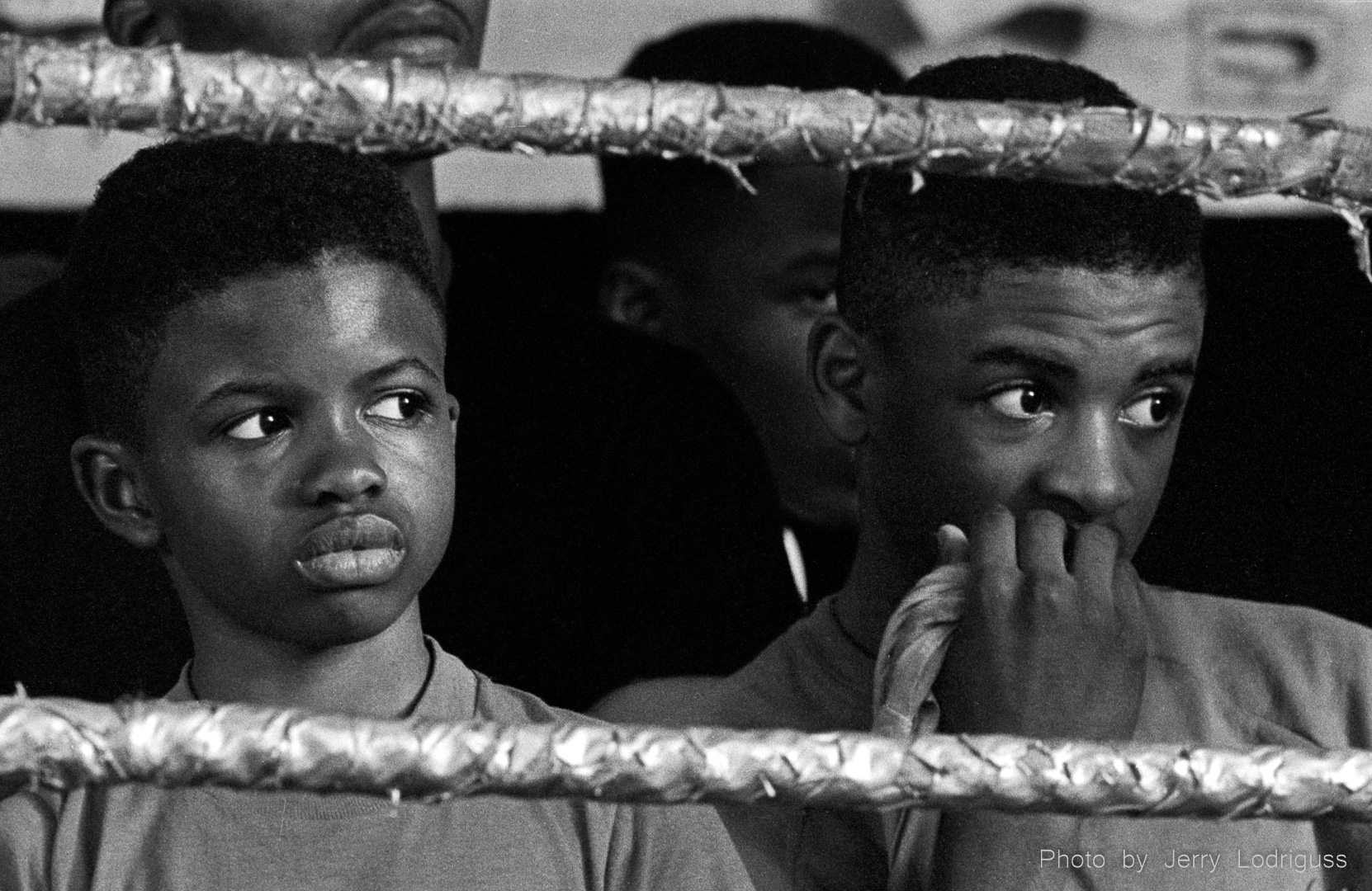 Kids watch boxers work out at Champ's Gym in Philadelphia.