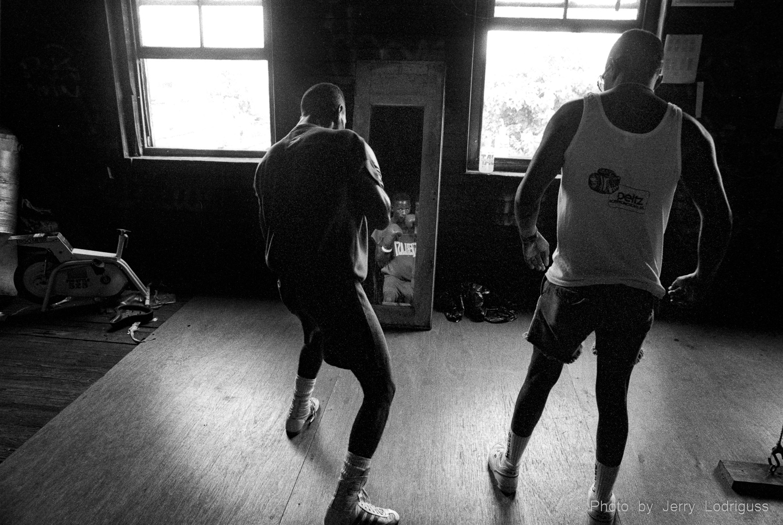 Tony Green works out in a mirror at Champ's Gym.