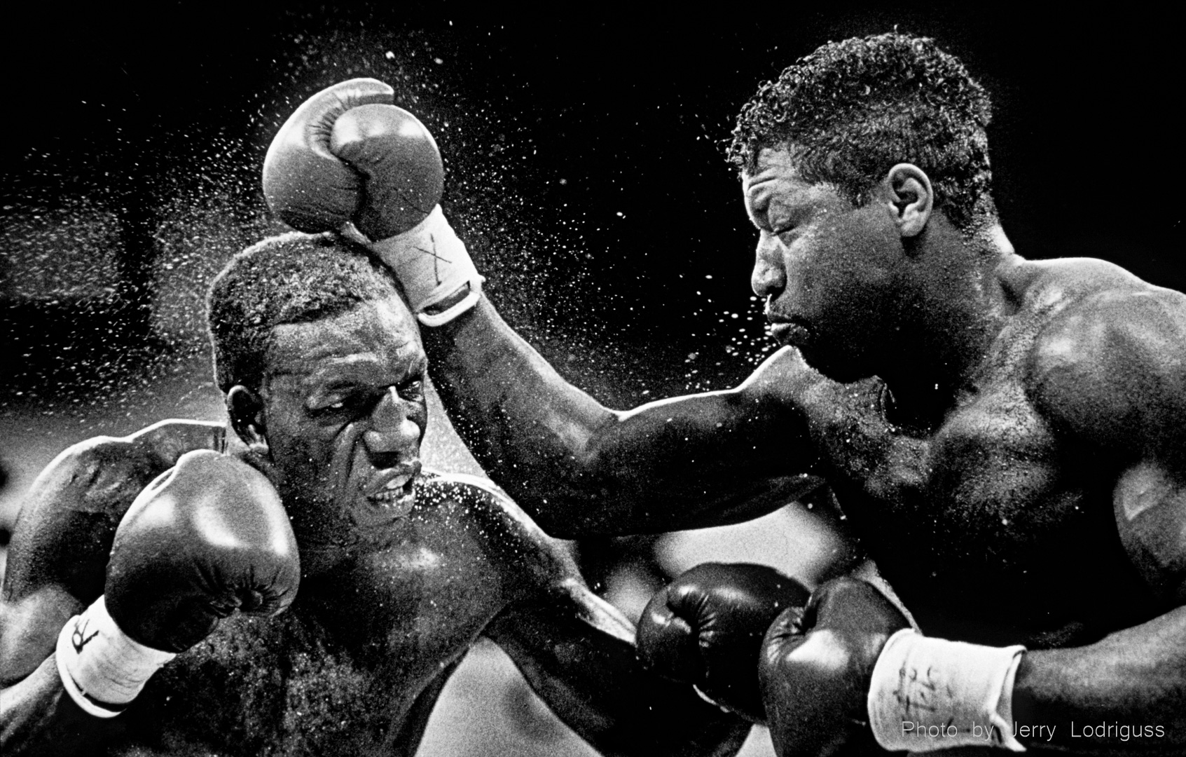 Heavyweight Ray Mercer (right) pounds opponent Wesley Watson in this fight at the Blue Horizon Boxing club in 1990.