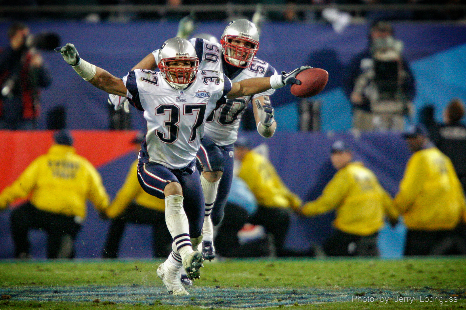 New England Patriots Rodney Harrison mockingly flaps his arms like an Eagle as he soars down the field after intercepting a a Donovan McNabb pass with 17 seconds left in the fourth quarter to seal the Patriots 24-21 victory over the Eagles in the Super Bowl XXXIX in Jacksonville on February 6, 2005.