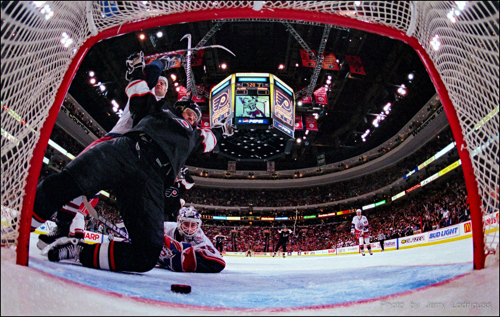 Ranger's goalie Mike Richter watches helplessly as Flyer's Valeri Zelepukin scores Flyer's 2nd goal in 3-1 win over rangers.