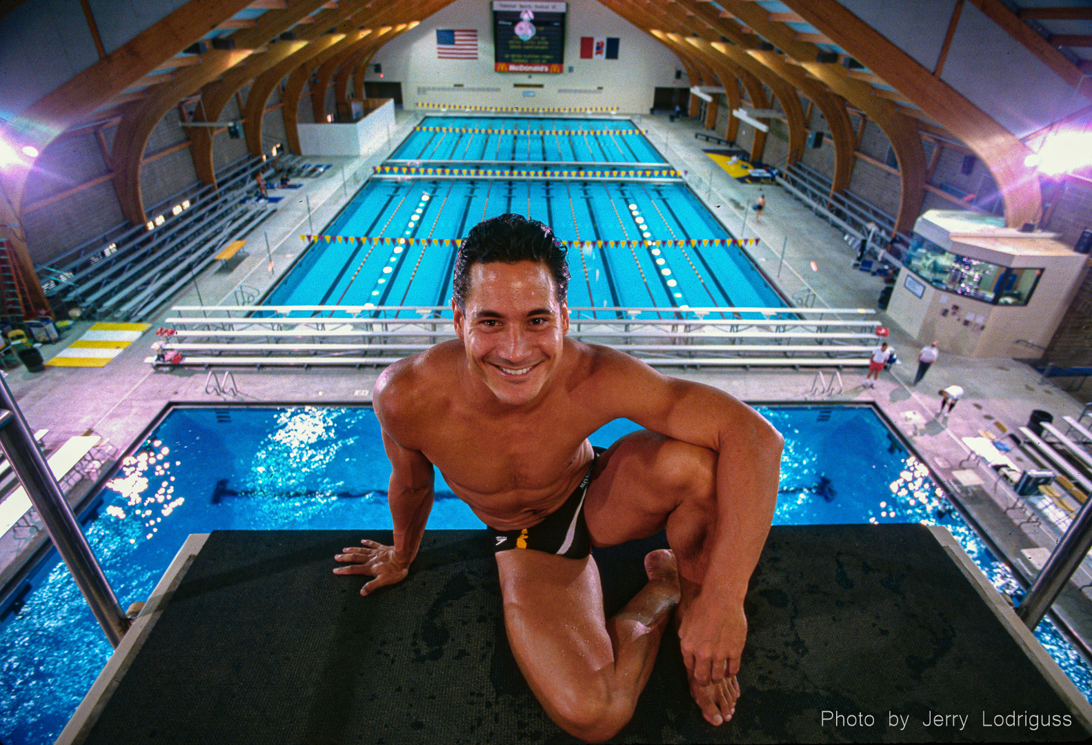 Greg Louganis, Olympic champion and holder of 41 national titles, poses for a portrait on top of the 10-meter diving platform during the 1987 United States Diving indoor championships.