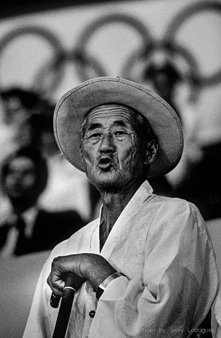 Woo Nam Baek of Chunju City watches the boxing competition during the 1988 Olympic Games in Seoul, South Korea.