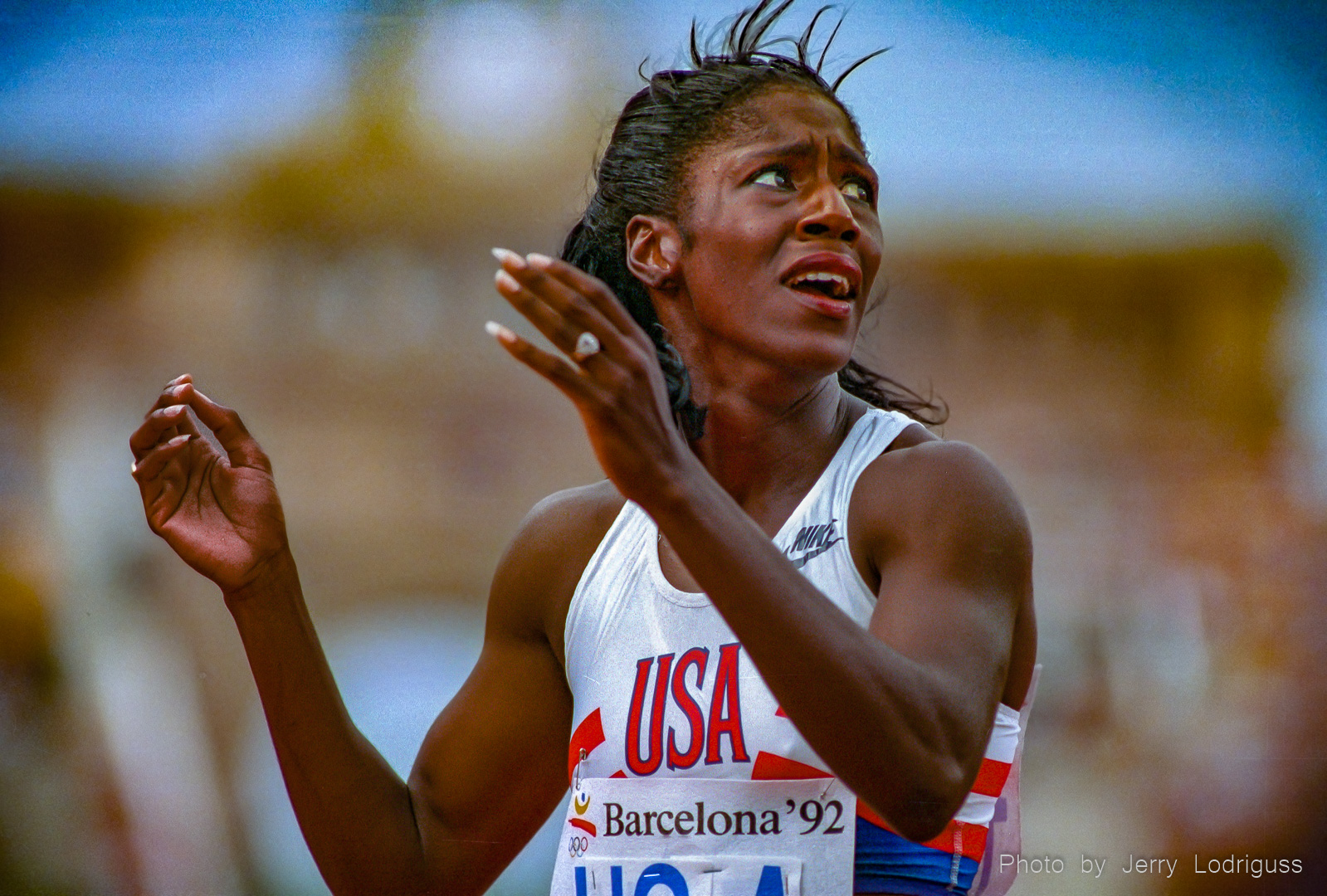 Gwen Torrence reacts as she looks at the scoreboard and sees she has won a gold medal in the women's 200 meters with a time of 21.81 seconds at the 1992 Barcelona Olympics.