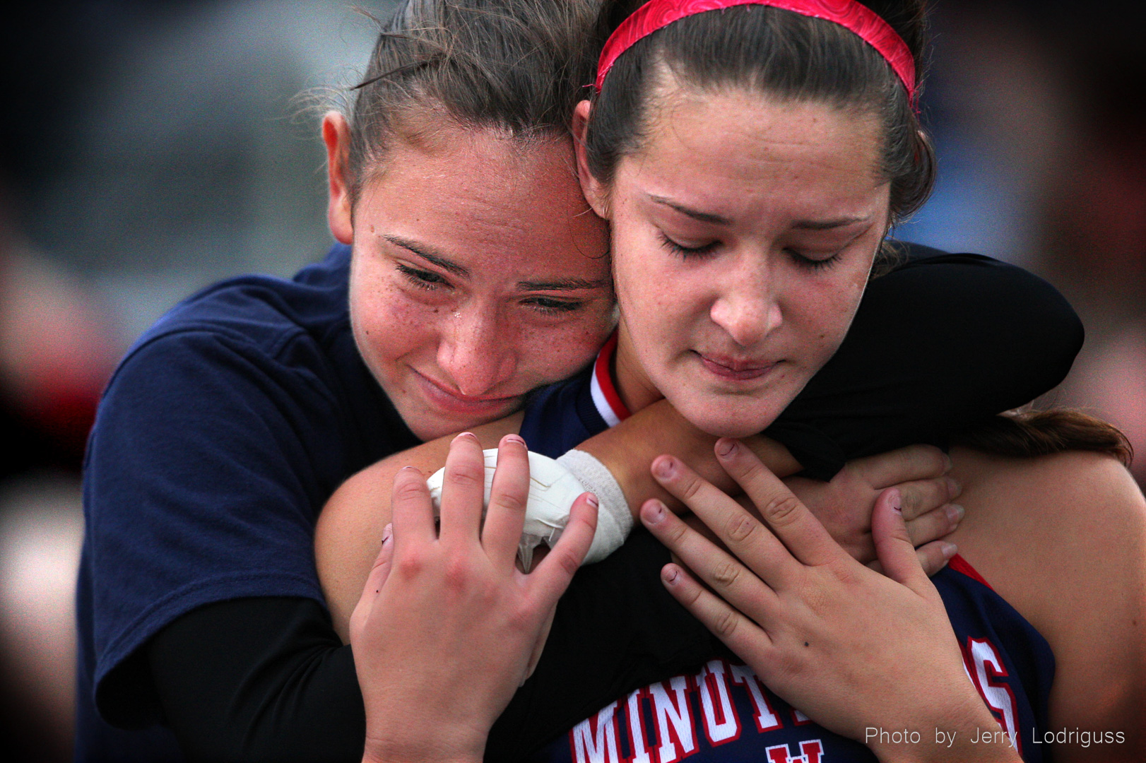 Washington Township's Zoey Miller (left) cries as she embraces teammate Sam DiCastelnuovo after their loss to Eastern in a south Jersey Group 4 field hockey semifinal game at Eastern High School in Voorhees, NJ on November 6, 2008.