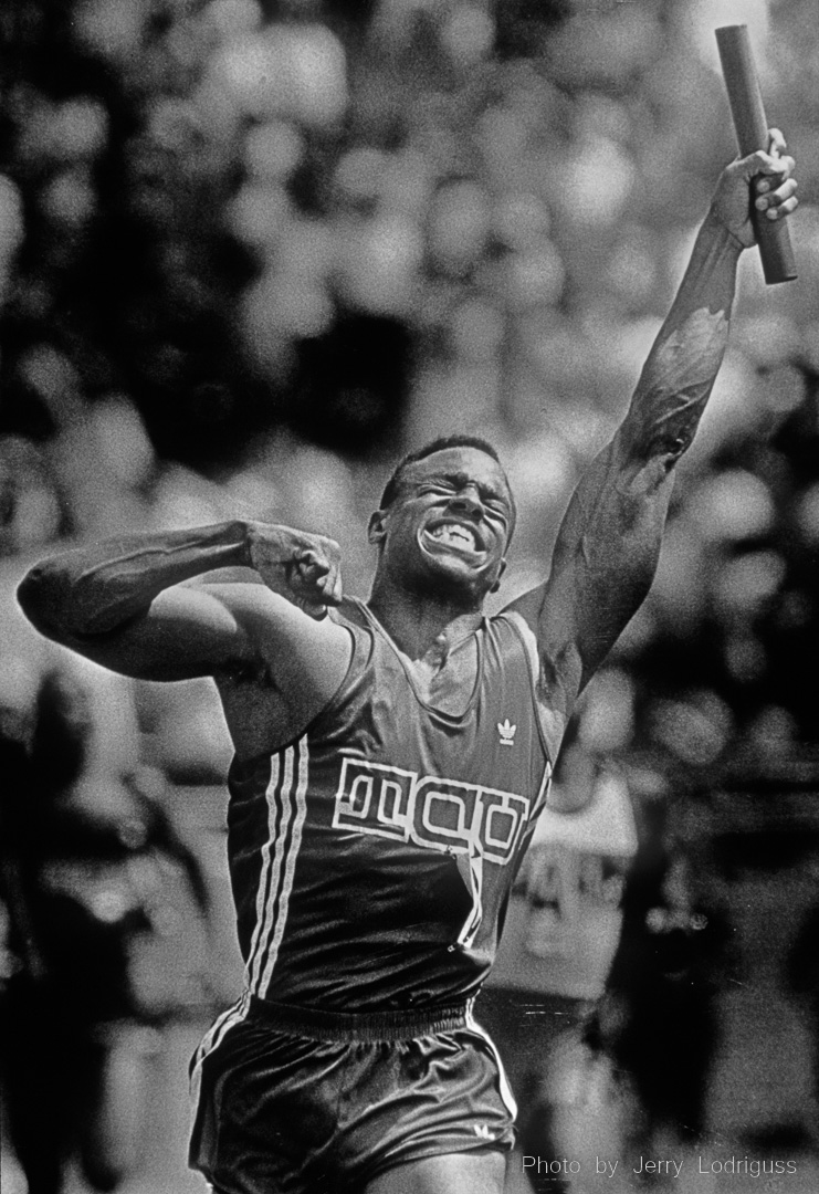 Jonathan Drummond of Texas Christian University exults after anchoring the final leg of TCU's winning effort in the 400 meter relays during the 1990 Penn Relays.